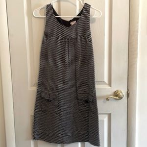 Blue jumper with white hearts and pocket detail. EUC